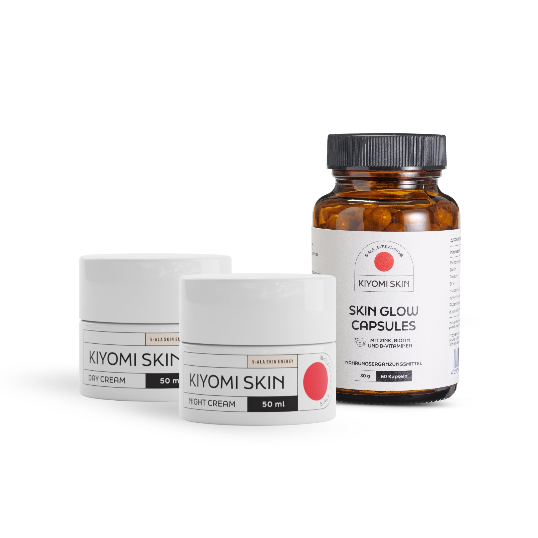 Two jars of Kiyomi Skin Cream and one bottle of Kiyomi Skin Glow Capsules are displayed on a white background, representing the Skin Longevity Ritual—a ganzheitliche Hautpflege designed to die Hautbarriere stärken for radiant, healthy skin.